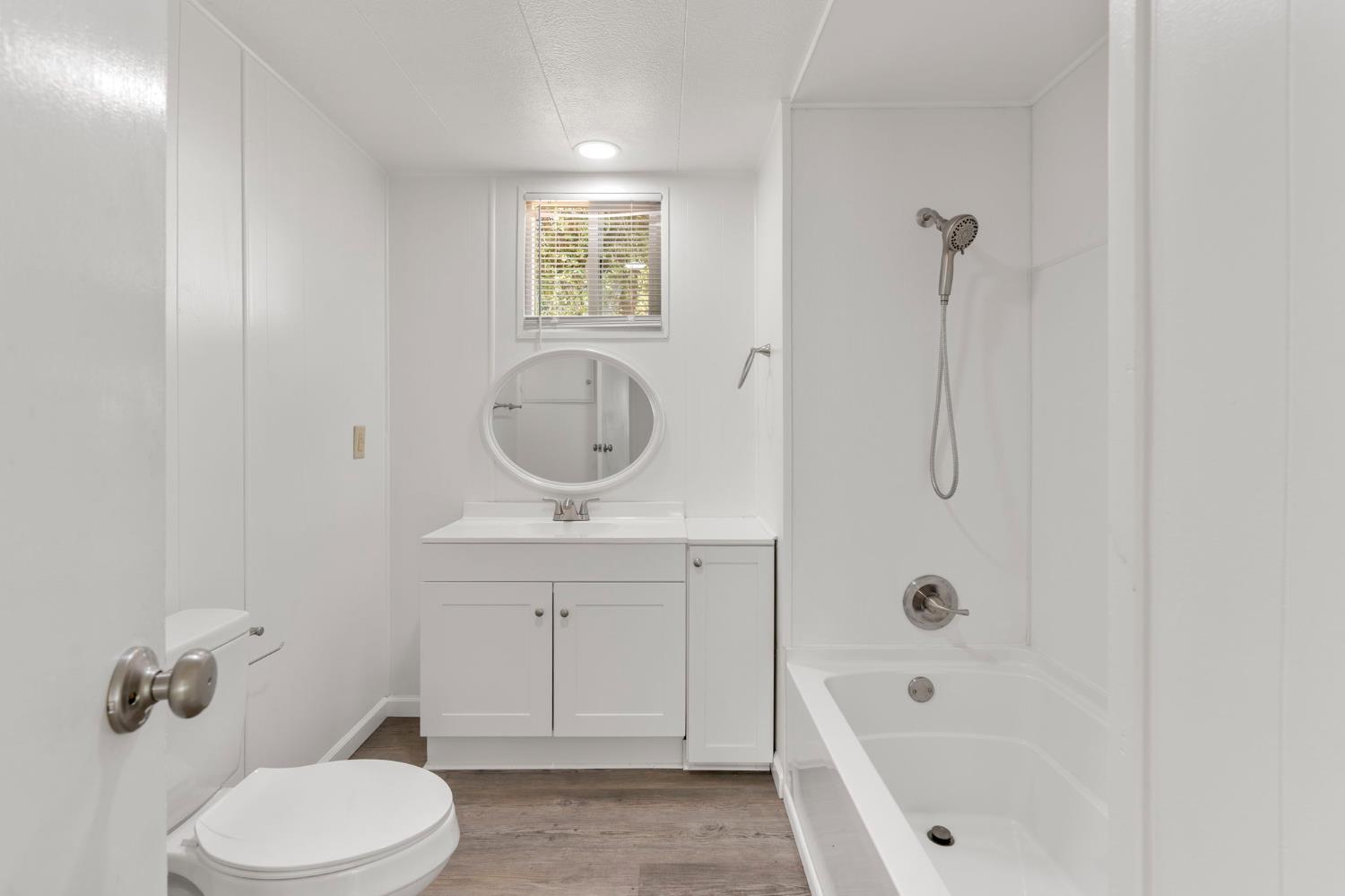 10155 Peppermint Circle, Unit 35 Jamestown, CA 95327 - Photo 23 of 27 a bathroom with a sink a toilet and shower