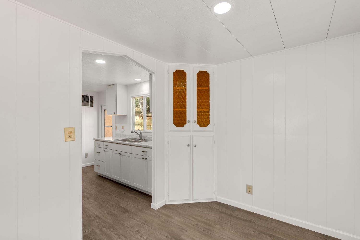 10155 Peppermint Circle, Unit 35 Jamestown, CA 95327 - Photo 10 of 27 a view of a kitchen with white cabinets