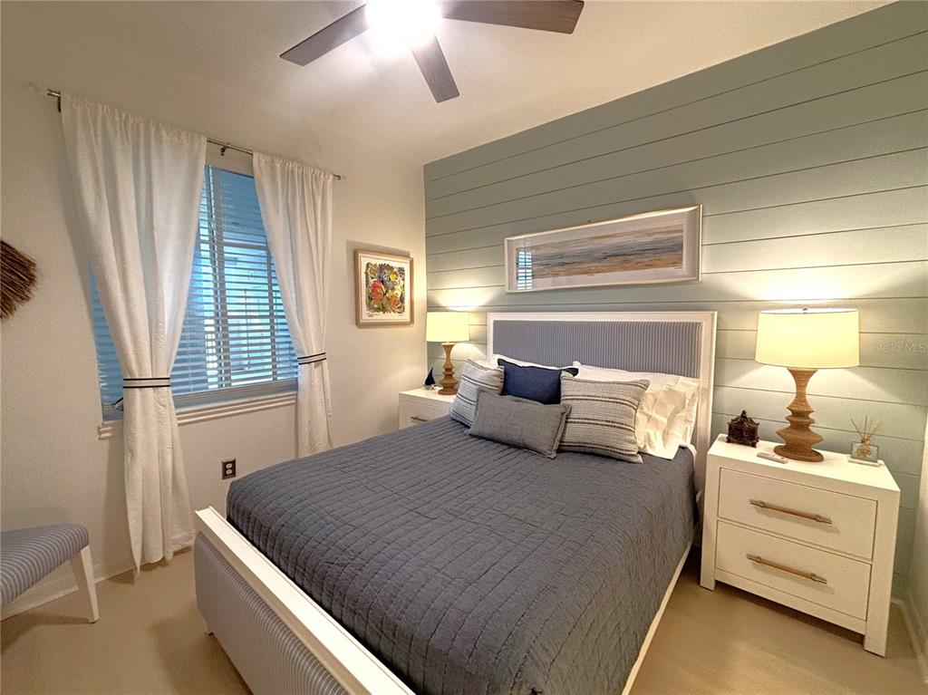 12140 Wellen Golf Street, Unit 404 Venice, FL 34293 - Photo 23 of 55 a bedroom with a bed and a window