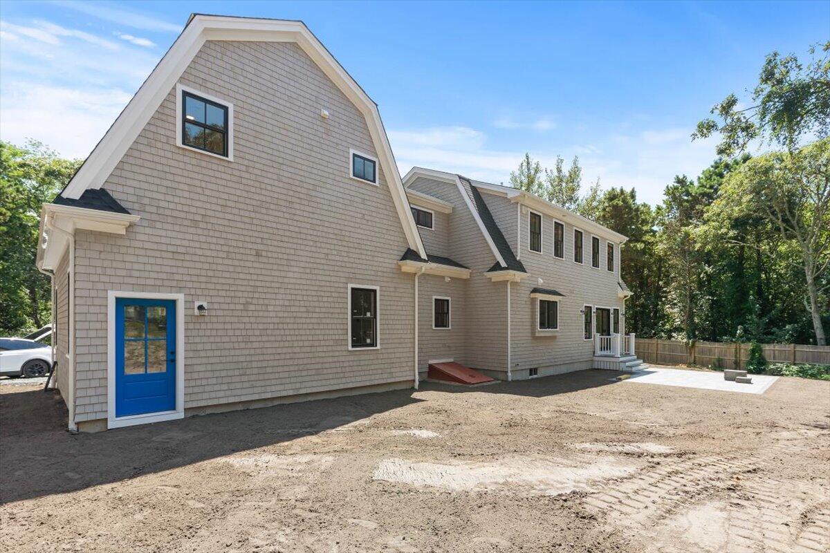 4 Nickerson's Circle South Chatham, MA 02659 - Photo 31 of 37 a front view of a house with a yard