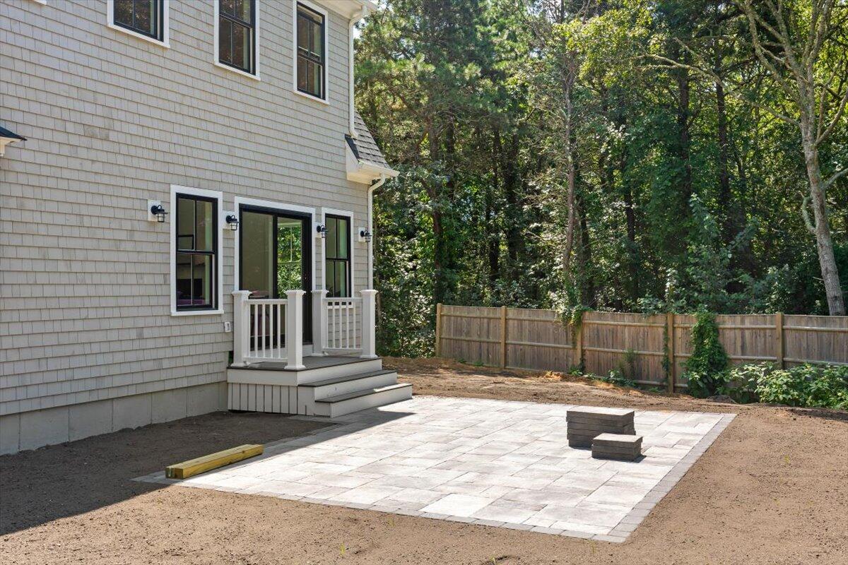 4 Nickerson's Circle South Chatham, MA 02659 - Photo 32 of 37 a house with swimming pool in front of it