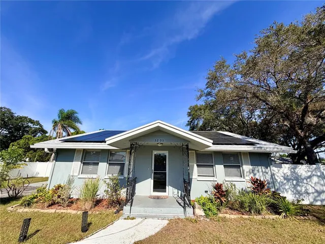a front view of a house with a porch
