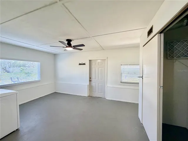 a view of storage and utility room with washer and dryer