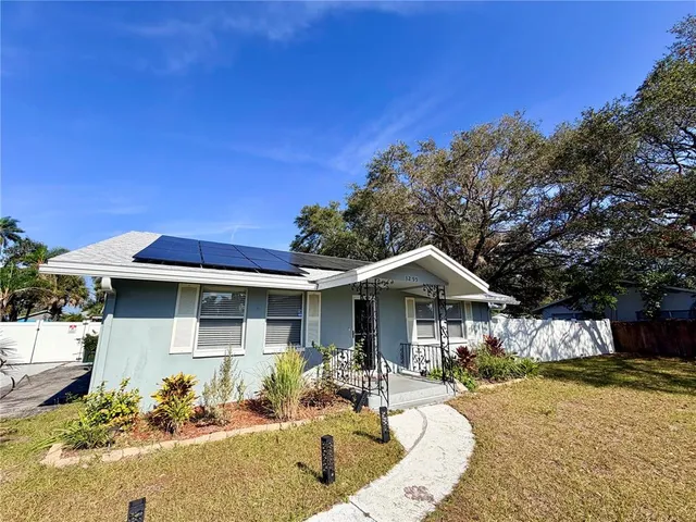 front view of a house with a yard