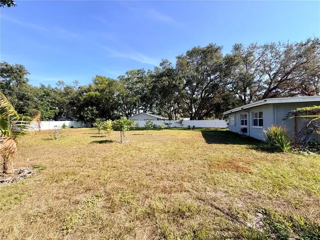 a view of swimming pool with an outdoor space and seating area