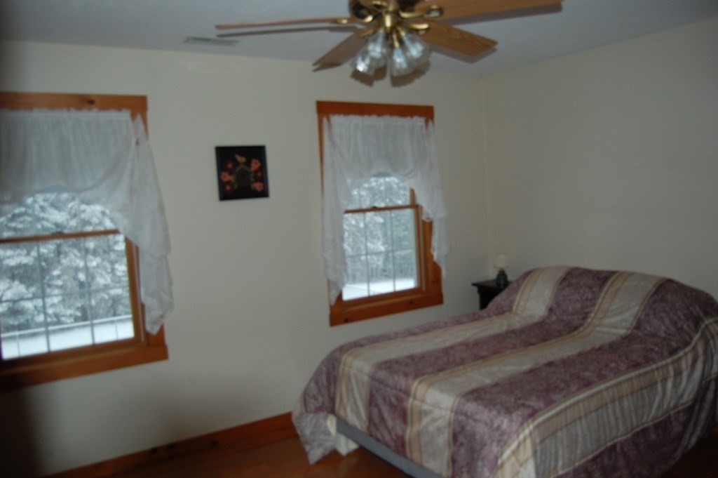215 Crouch Road Warren, MA 01092 - Photo 21 of 33 a bedroom with a bed and a window