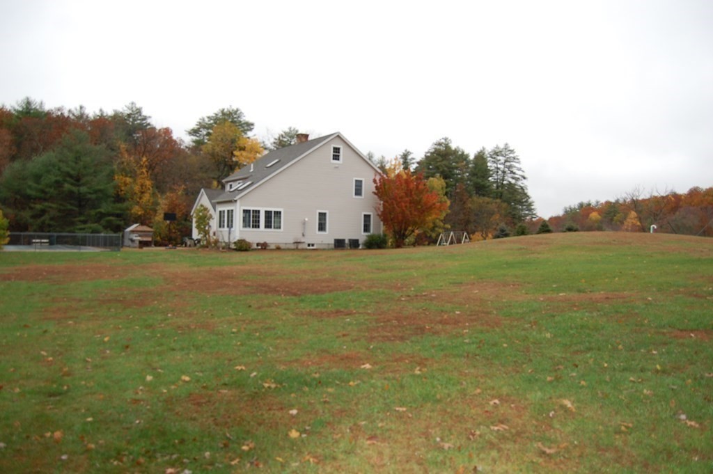 215 Crouch Road Warren, MA 01092 - Photo 5 of 33 a view of a house with a yard