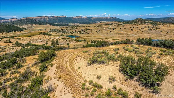 a view of mountains and an ocean