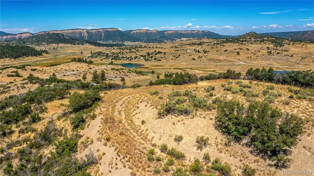 a view of mountains and an ocean