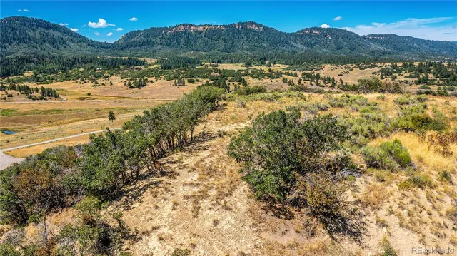 a view of lake with mountain