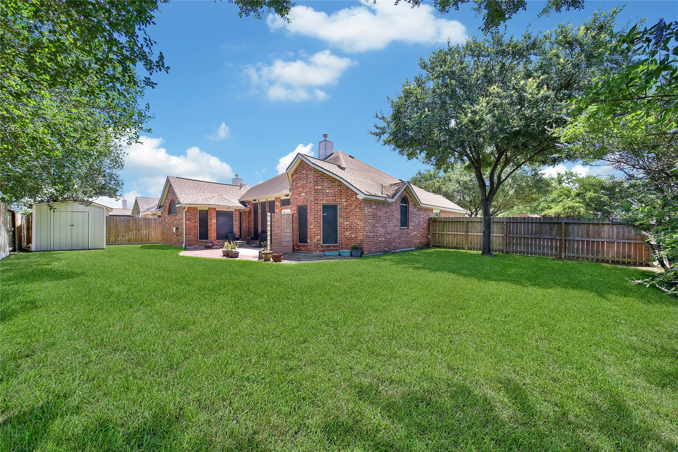 21338 Timber Pines Drive Spring, TX 77388 - Photo 28 of 29 a view of a house with backyard and garden