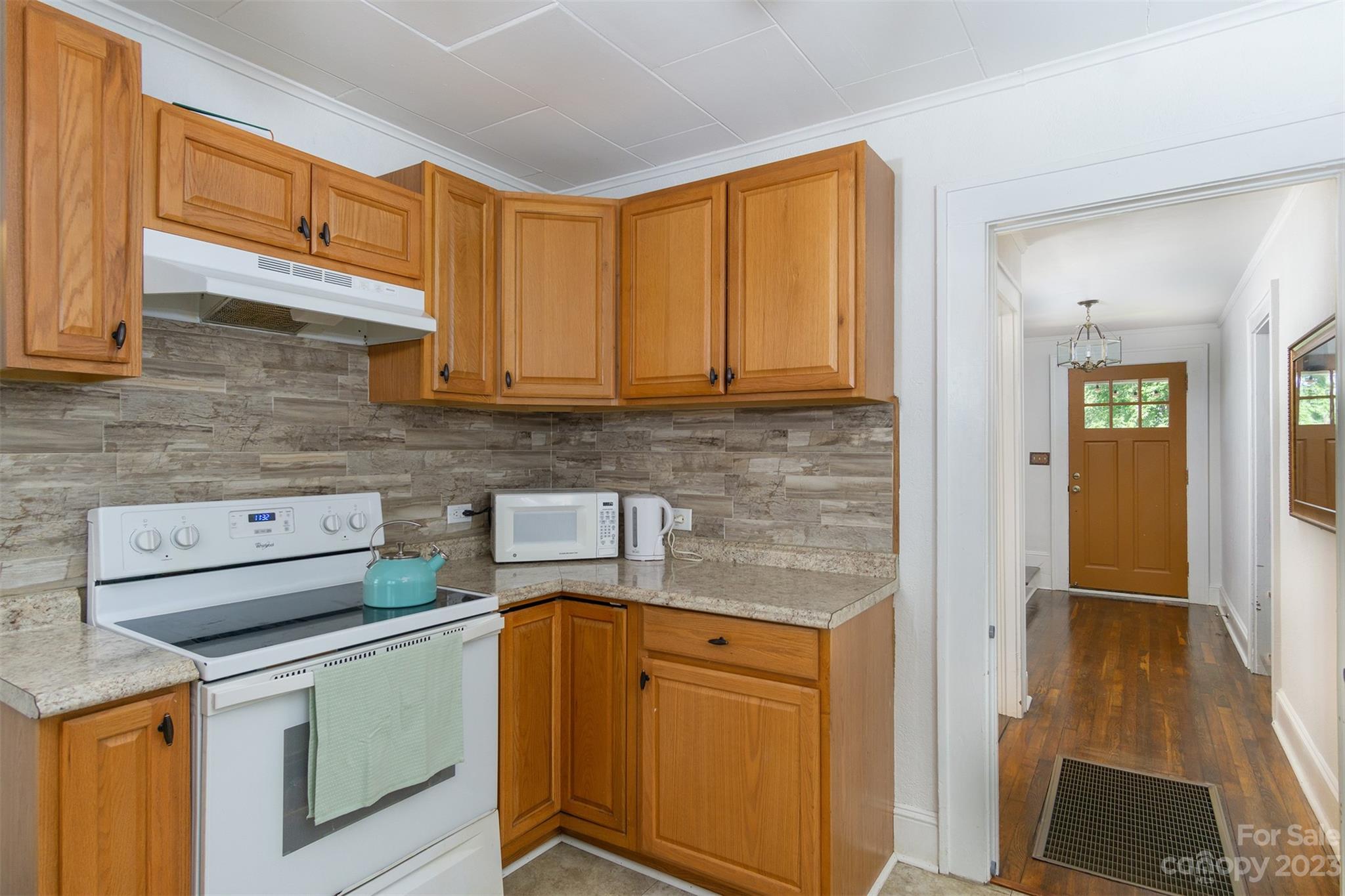 404 Huffman Street Morganton, NC 28655 - Photo 12 of 27 a kitchen with stainless steel appliances granite countertop a sink stove and cabinets