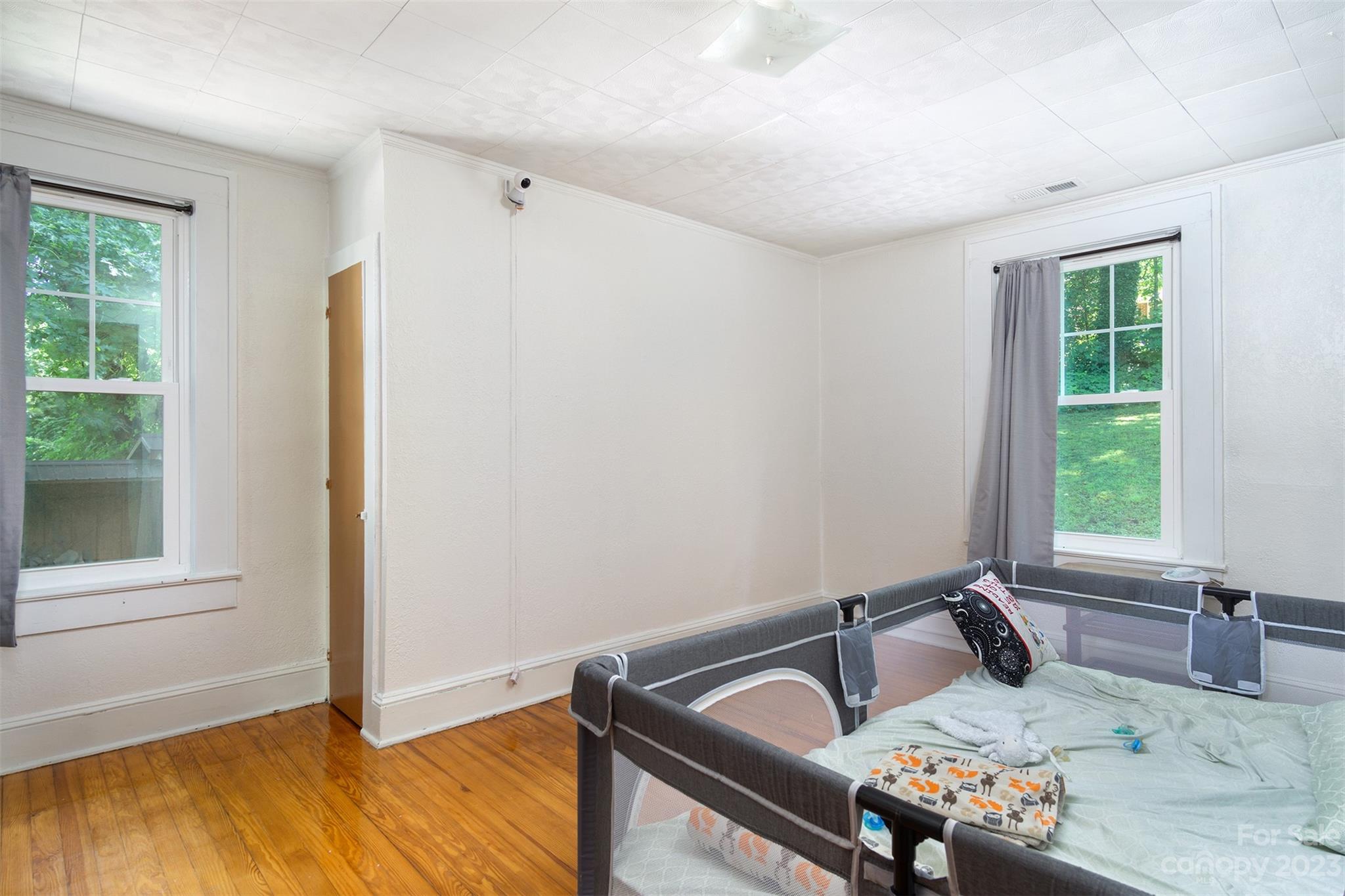 404 Huffman Street Morganton, NC 28655 - Photo 15 of 27 a living room with furniture and a window