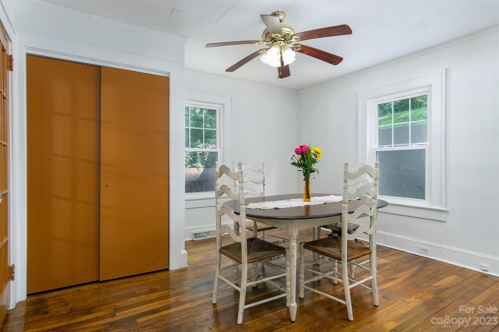 404 Huffman Street Morganton, NC 28655 - Photo 19 of 27 a view of a dining room with furniture window and wooden floor