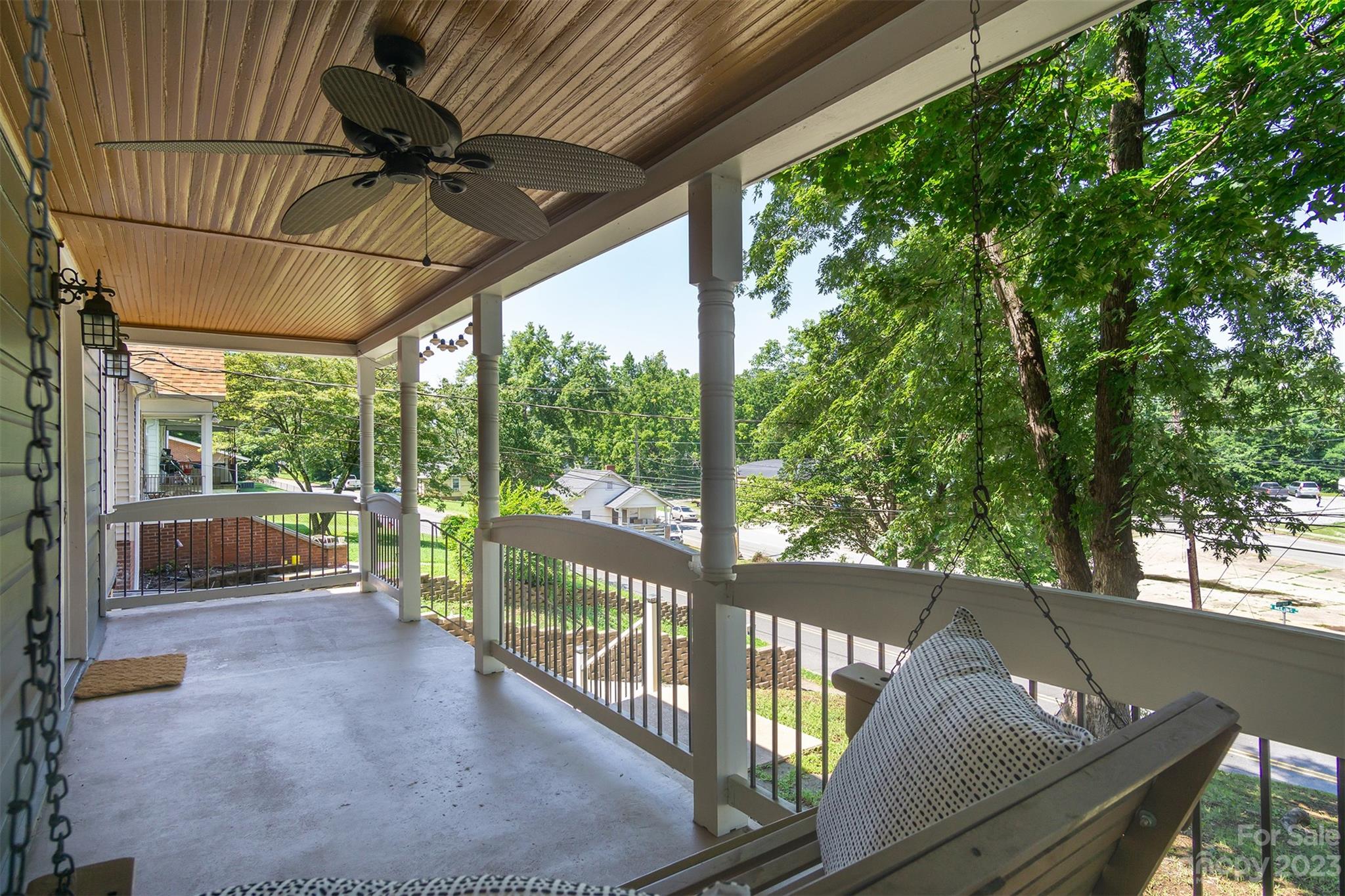 404 Huffman Street Morganton, NC 28655 - Photo 2 of 27 a view of a porch with furniture and a backyard
