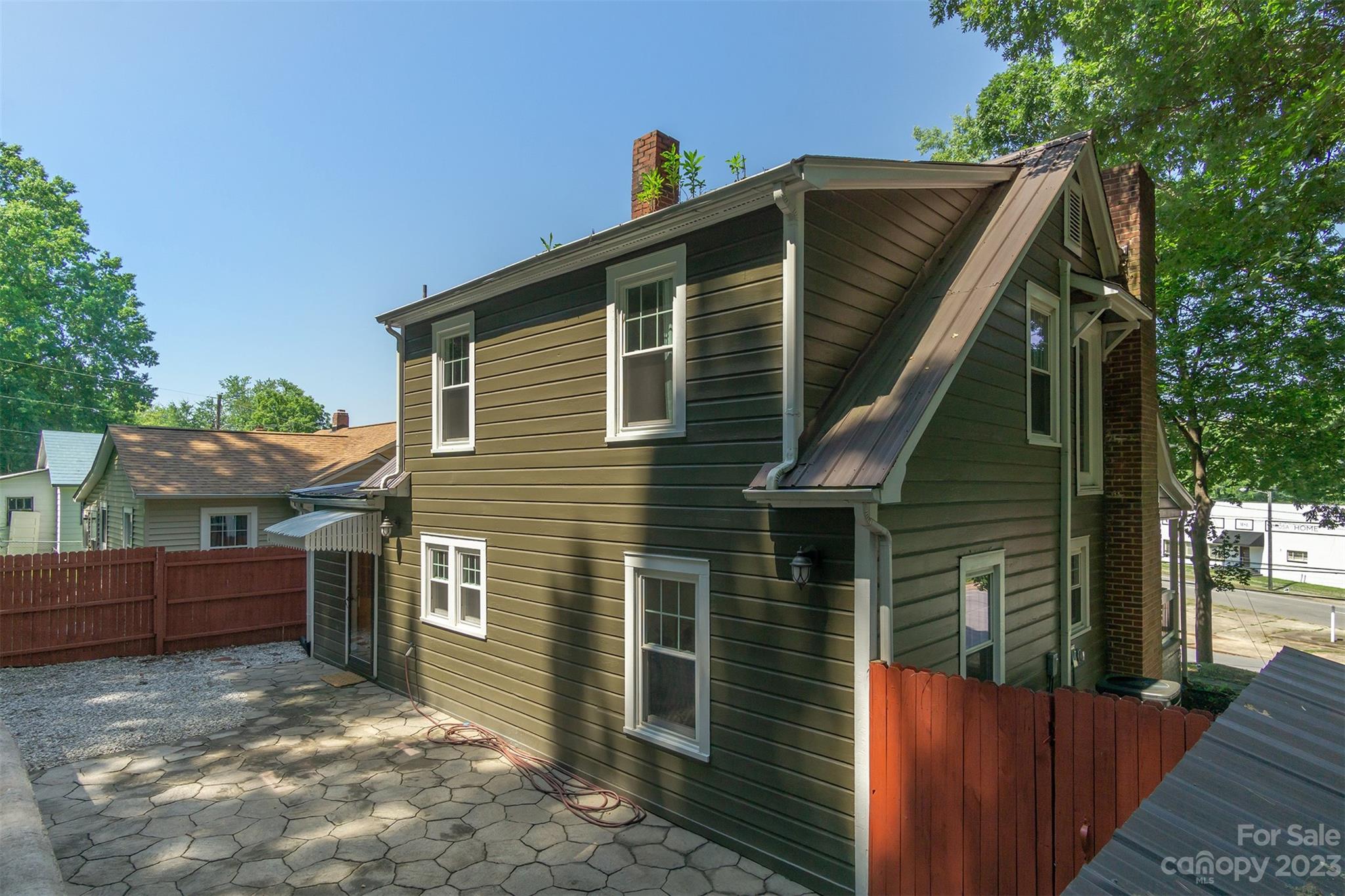 404 Huffman Street Morganton, NC 28655 - Photo 22 of 27 a front view of a house with a tree