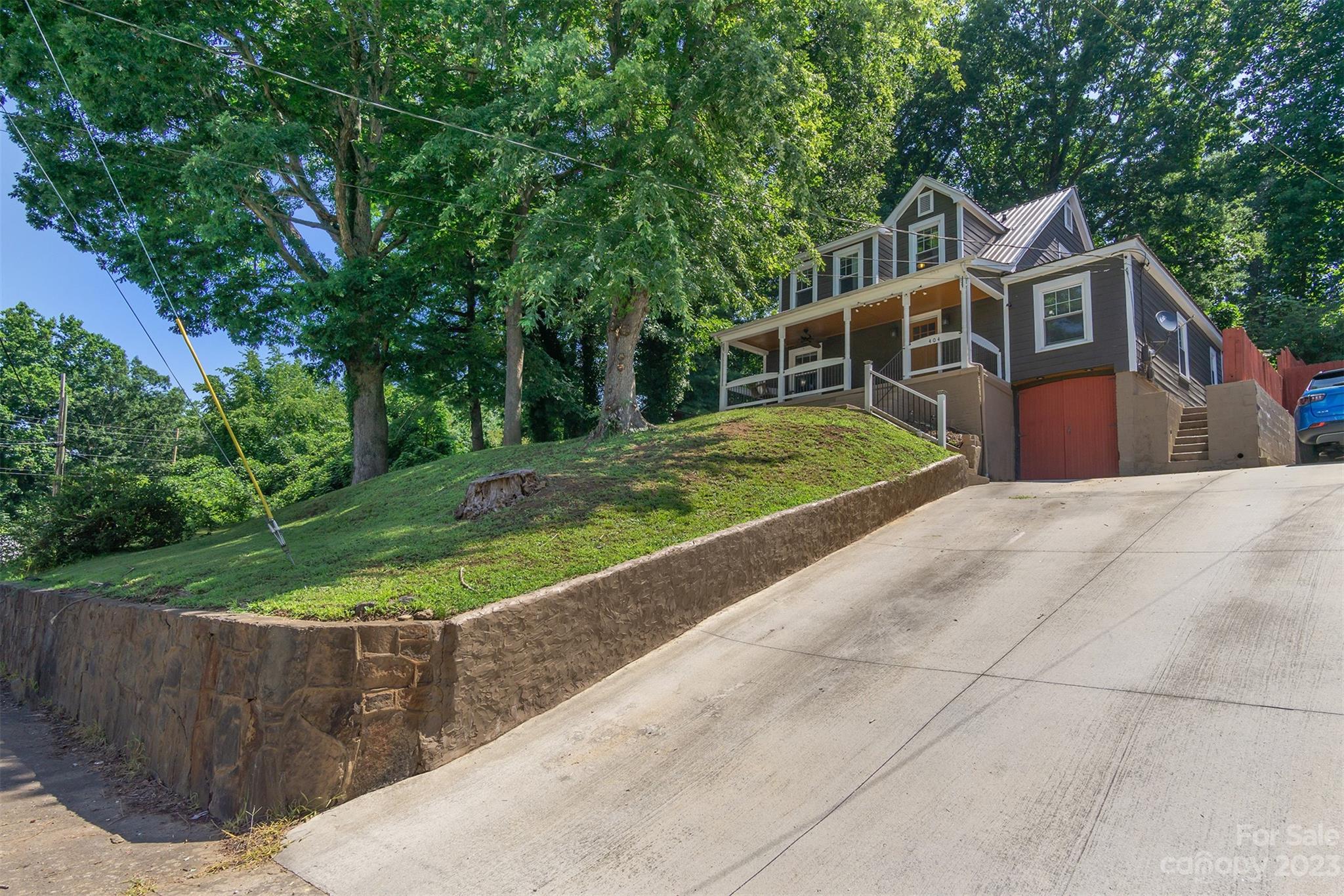 404 Huffman Street Morganton, NC 28655 - Photo 5 of 27 a front view of a house with a yard