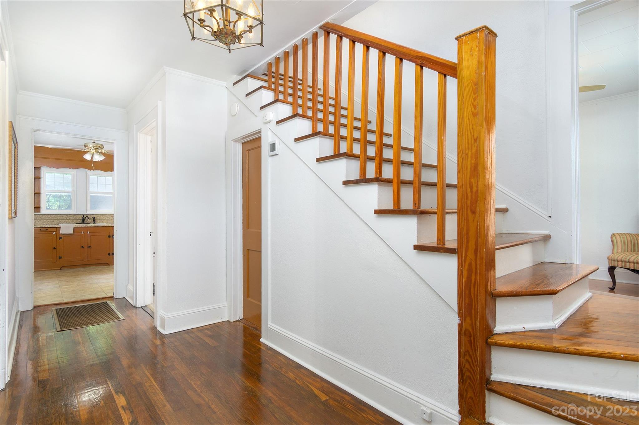 404 Huffman Street Morganton, NC 28655 - Photo 7 of 27 a view of entryway and hall with wooden floor
