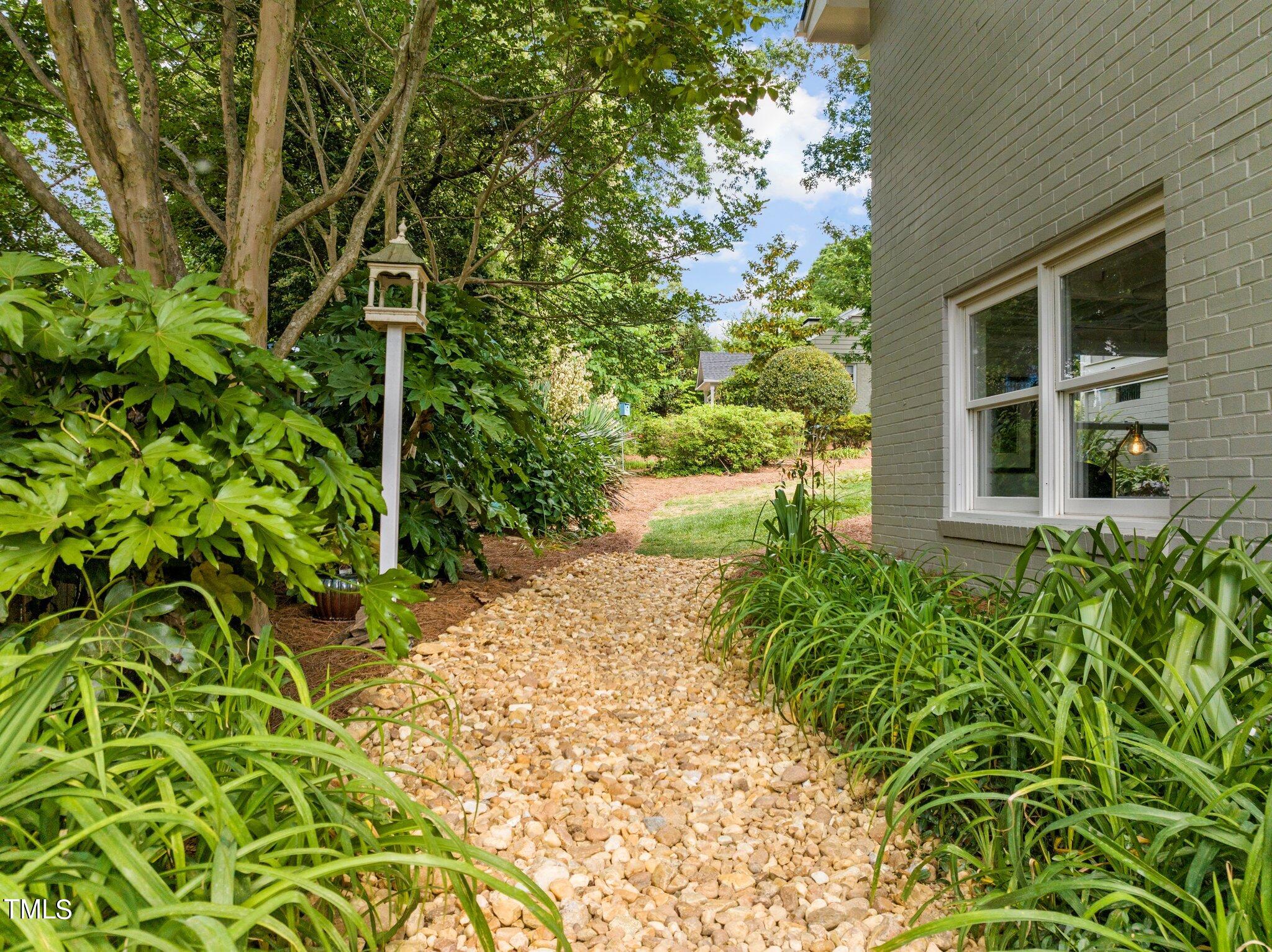 1110 Dogwood Lane Raleigh, NC 27607 - Photo 30 of 46 Garden path outside basement office