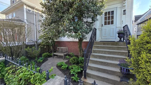 a view of a garden with pathway