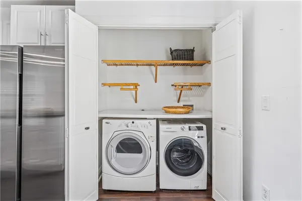 a utility room with dryer and washer