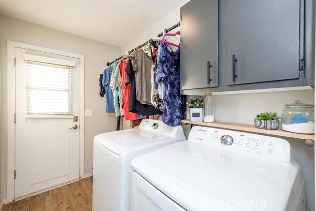 15222 Riverside Drive Apple Valley, CA 92307 - Photo 24 of 43 a utility room with dryer and washer