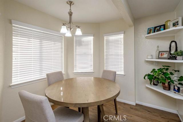 15222 Riverside Drive Apple Valley, CA 92307 - Photo 10 of 43 a dining room with furniture and window
