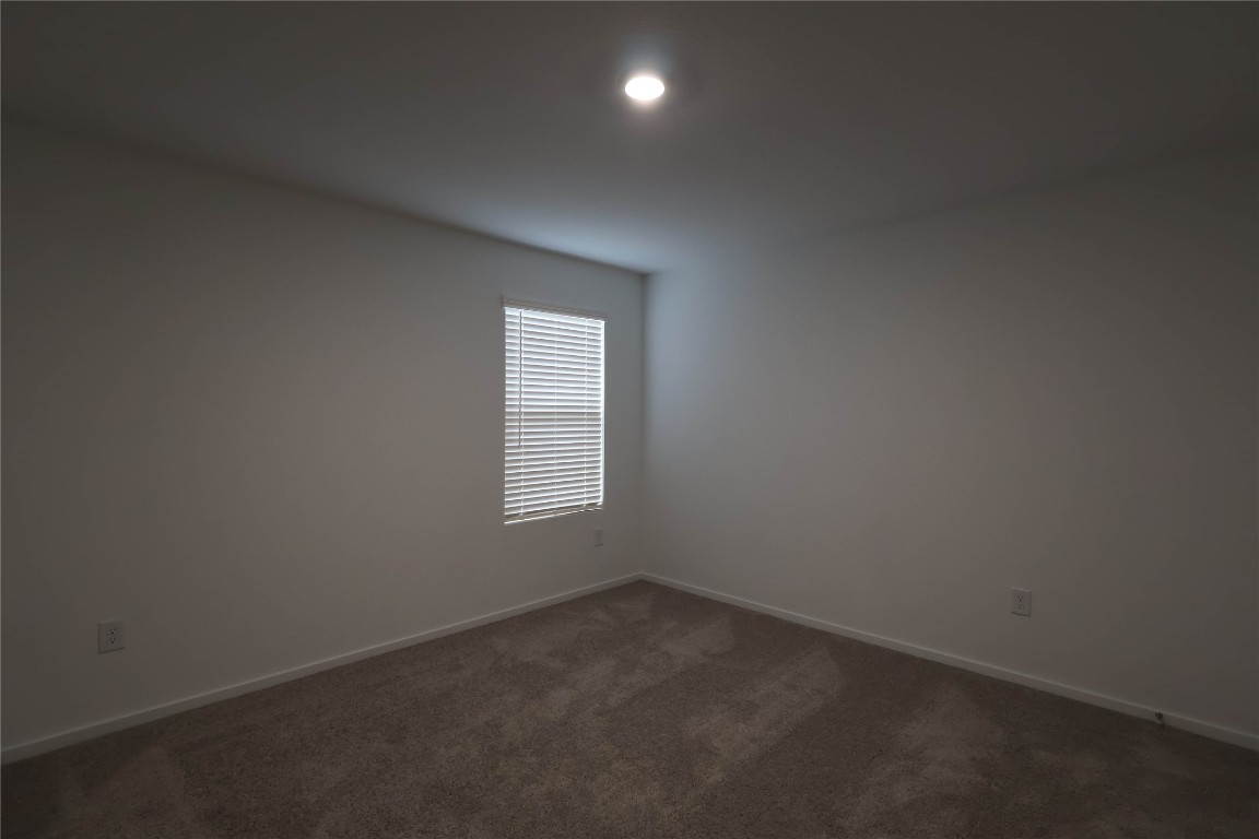 15357 Dapple Blf Lane Conroe, TX 77302 - Photo 15 of 17 an empty room with a window
