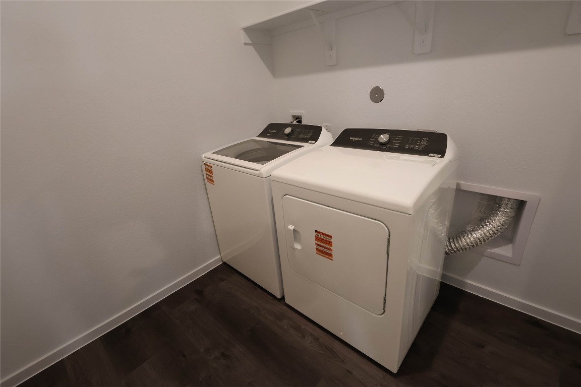 15357 Dapple Blf Lane Conroe, TX 77302 - Photo 5 of 17 a utility room with dryer and washer
