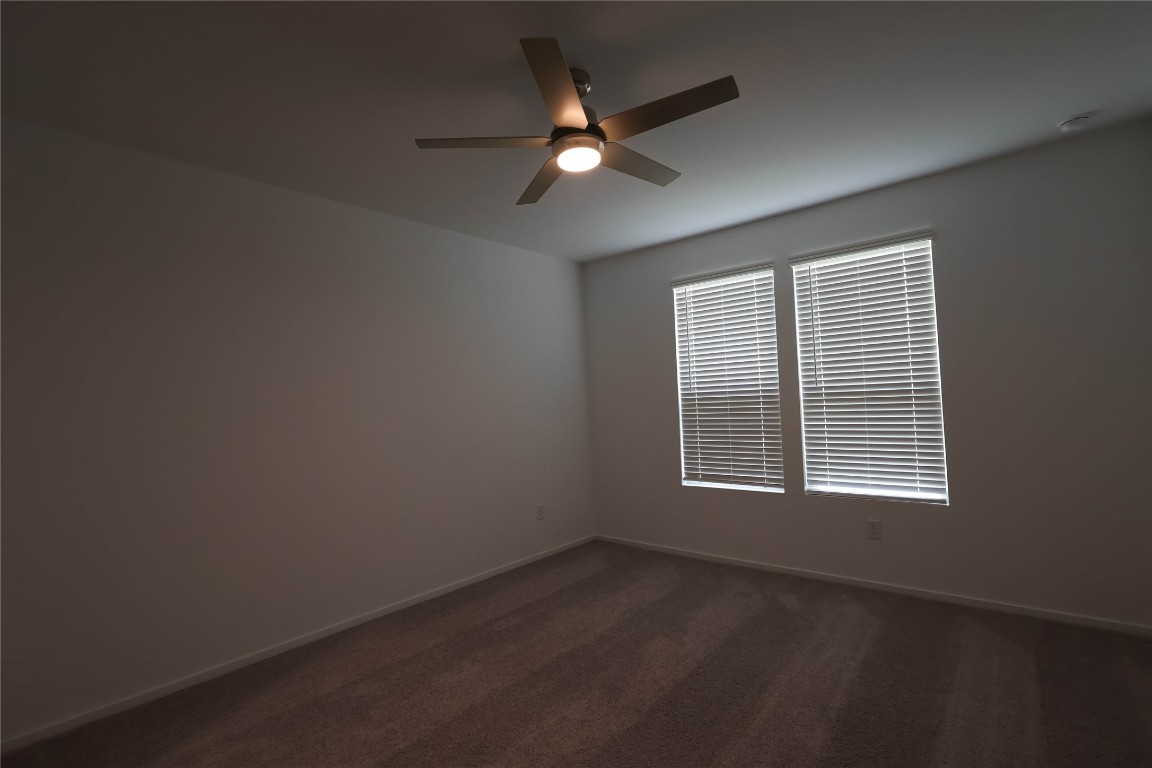 15357 Dapple Blf Lane Conroe, TX 77302 - Photo 6 of 17 an empty room with a window