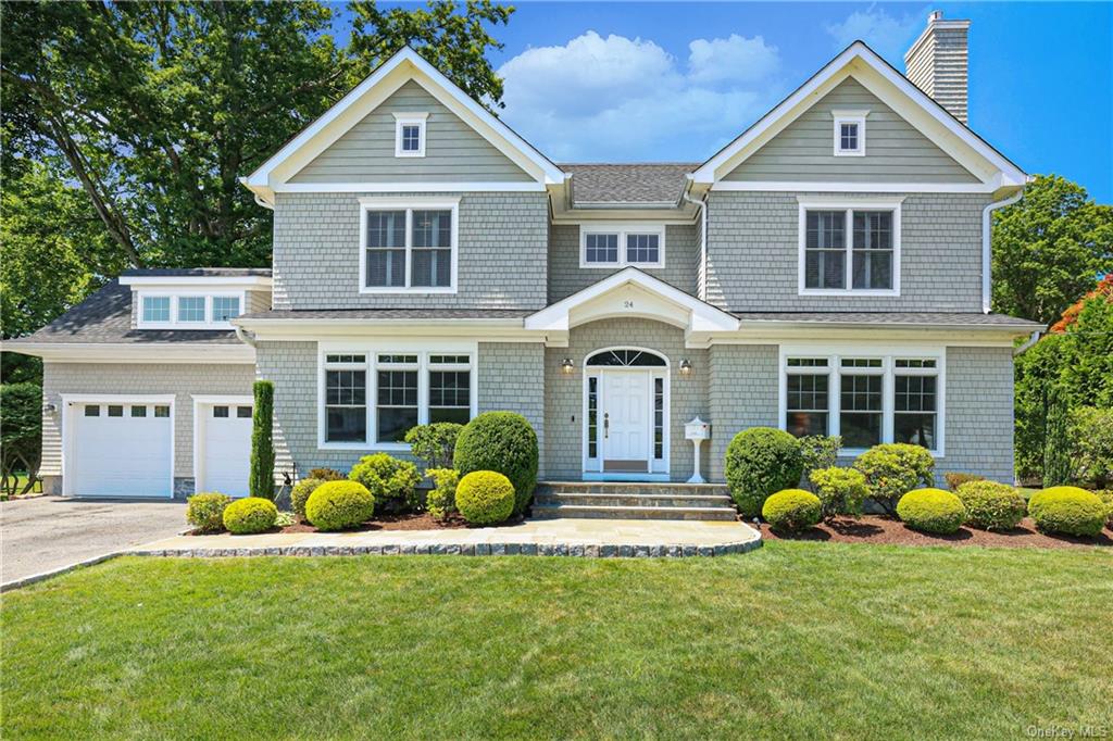 24 Maple Avenue Rye, NY 10580 - Photo 1 of 1 a front view of a house with a yard and porch