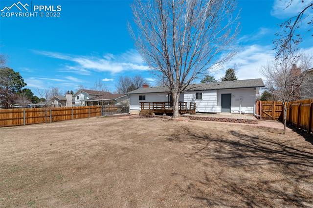 4095 Hollow Road Colorado Springs, CO 80917 - Photo 37 of 41 Back of the home and yard.