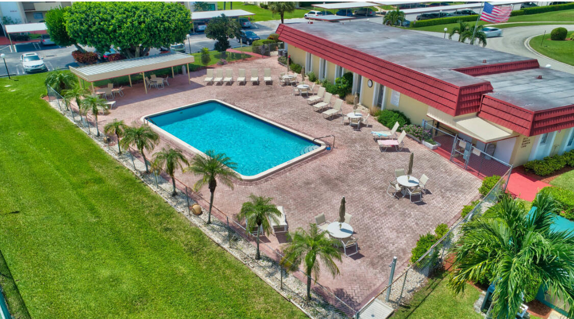 23249 Barwood Lane North, Unit 402 Boca Raton, FL 33428 - Photo 27 of 27 an aerial view of a house with a garden