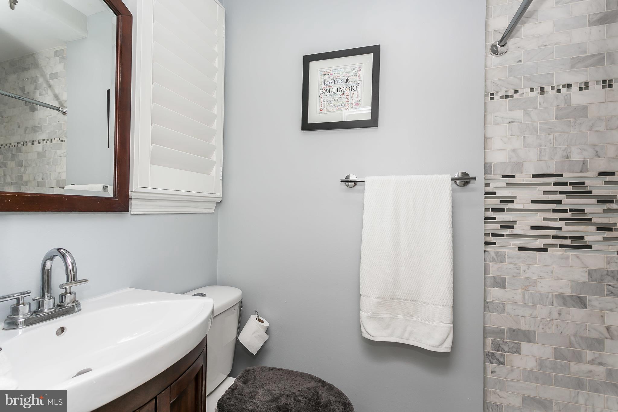 13902 Baldwin Mill Road Baldwin, MD 21013 - Photo 17 of 30 a bathroom with a sink toilet and shower
