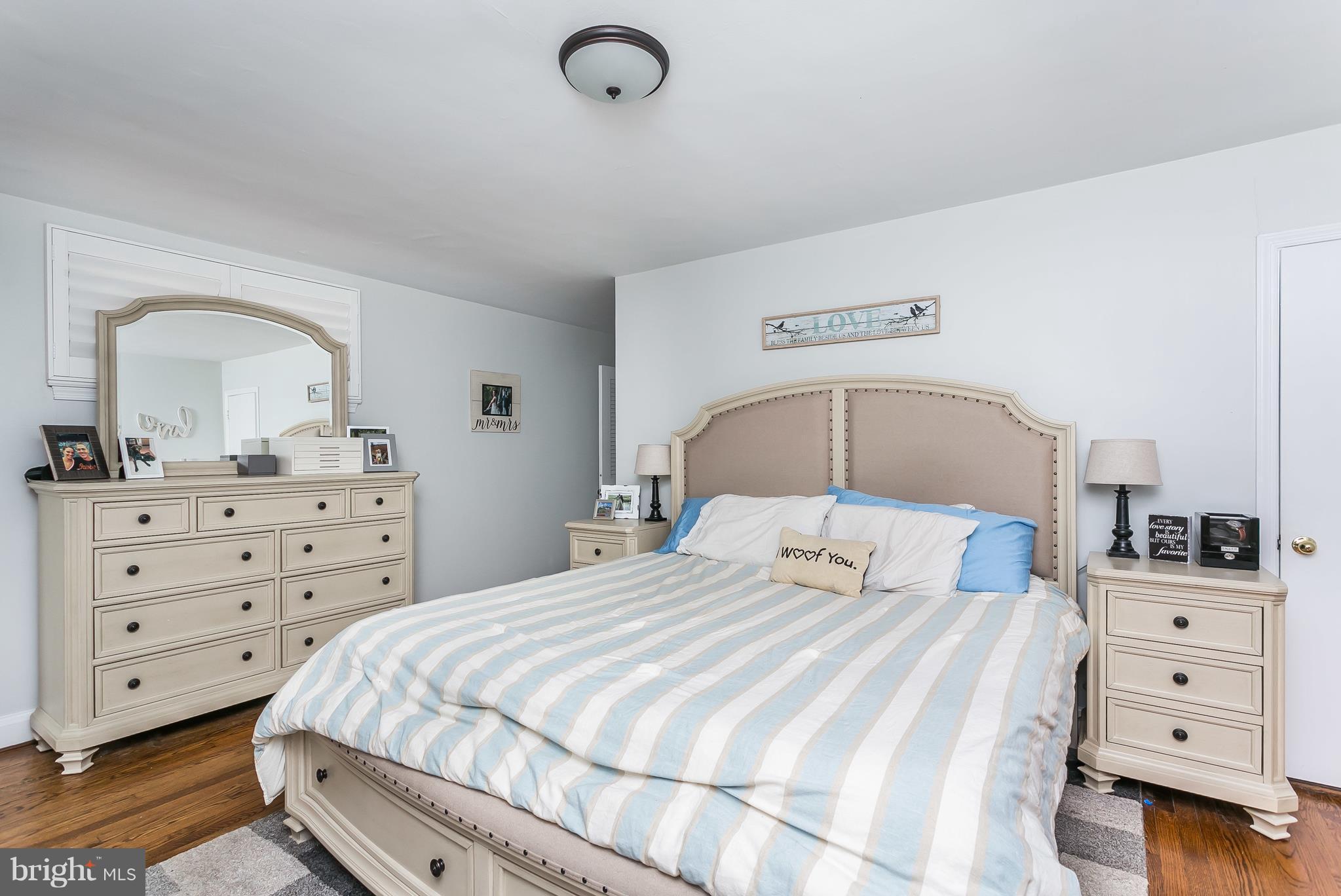 13902 Baldwin Mill Road Baldwin, MD 21013 - Photo 23 of 30 a bedroom with a bed and a dresser