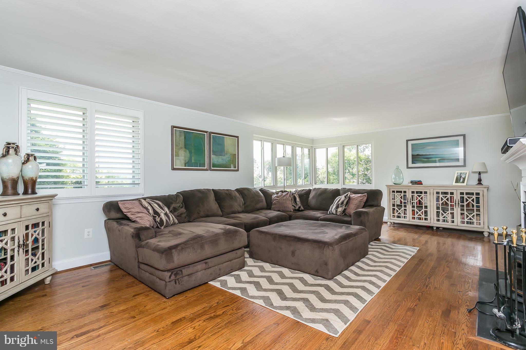 13902 Baldwin Mill Road Baldwin, MD 21013 - Photo 5 of 30 a living room with furniture window and a wooden floor
