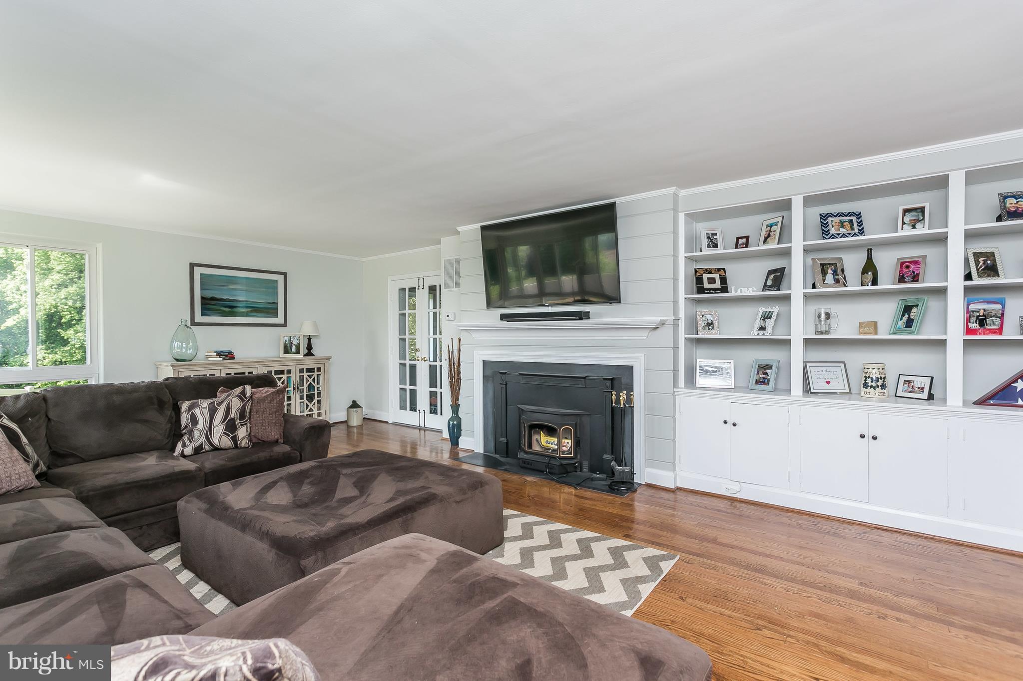 13902 Baldwin Mill Road Baldwin, MD 21013 - Photo 6 of 30 a living room with furniture and a fireplace