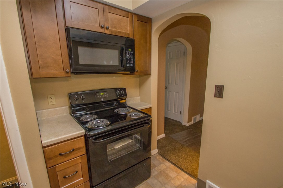 7730 Broadview Road Cleveland, OH 44134 - Photo 4 of 18 Brand new electric range and microwave.