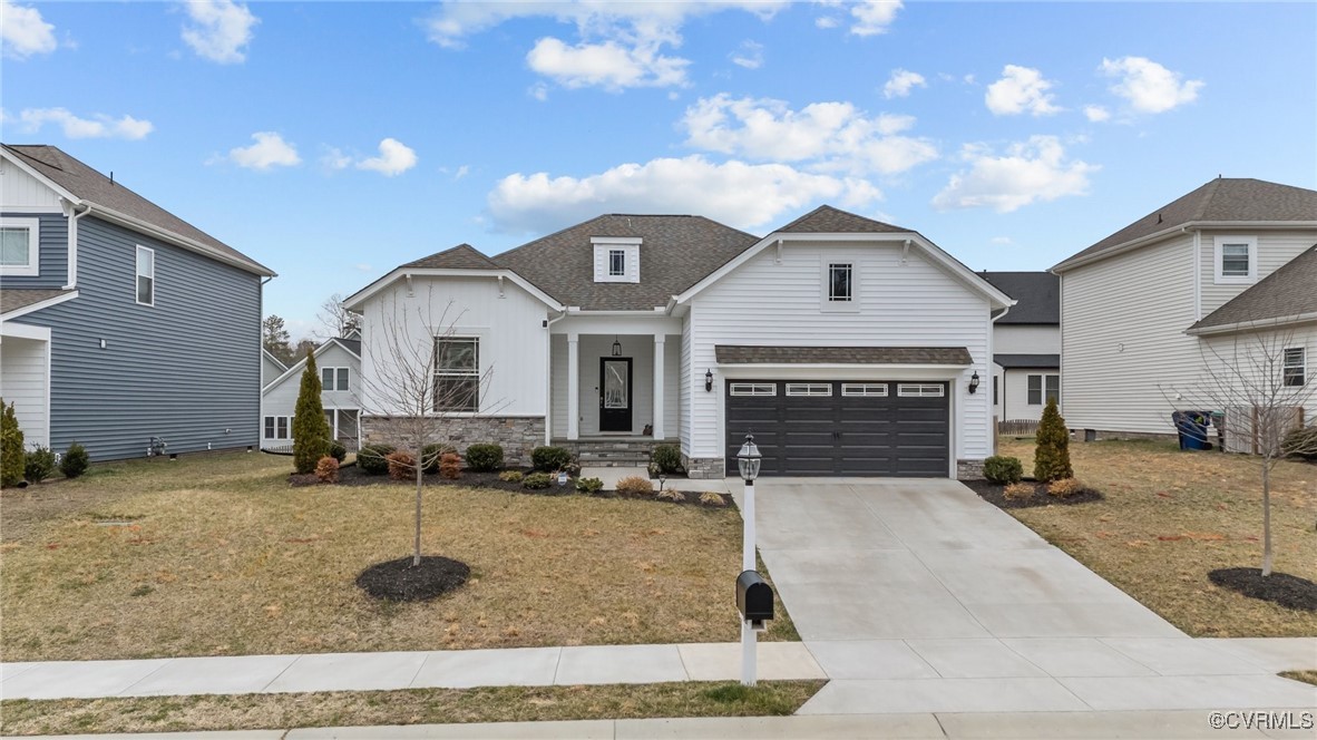 15624 Cedarville Drive Midlothian, VA 23112 - Photo 1 of 49 a front view of a house with yard