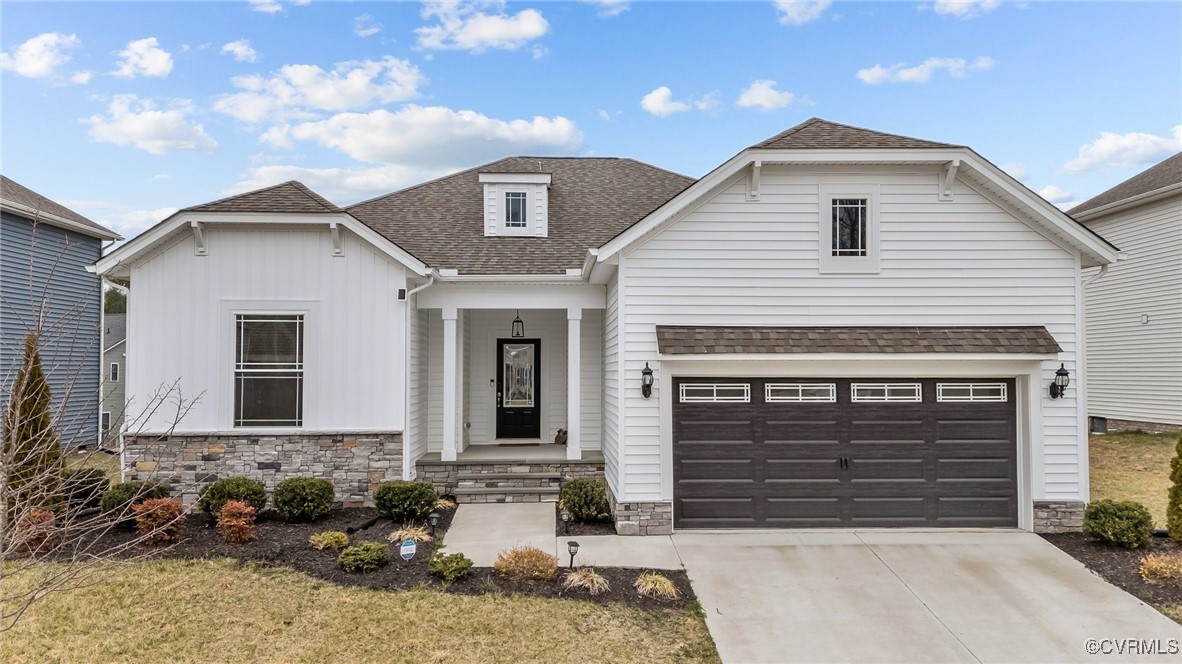 15624 Cedarville Drive Midlothian, VA 23112 - Photo 2 of 49 a front view of a house with garden