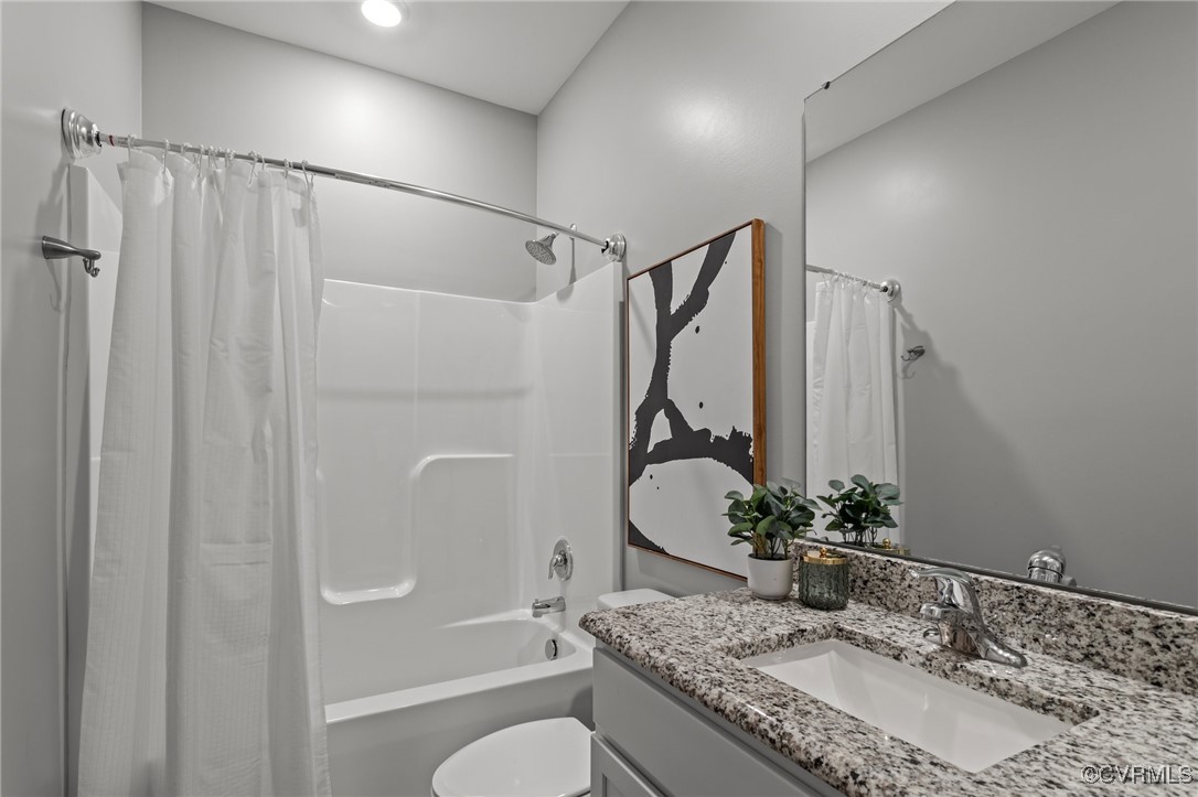 15624 Cedarville Drive Midlothian, VA 23112 - Photo 32 of 49 a bathroom with a granite countertop sink toilet and shower