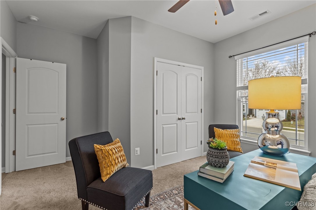 15624 Cedarville Drive Midlothian, VA 23112 - Photo 35 of 49 a living room with furniture and a window