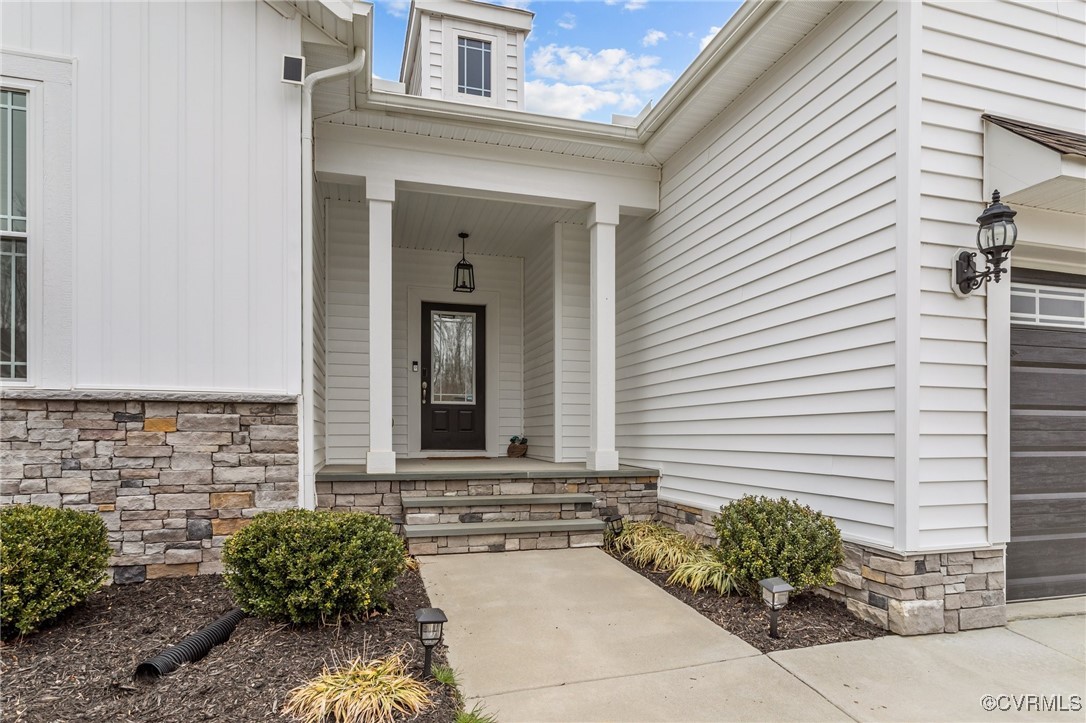 15624 Cedarville Drive Midlothian, VA 23112 - Photo 4 of 49 a front view of a house with a yard