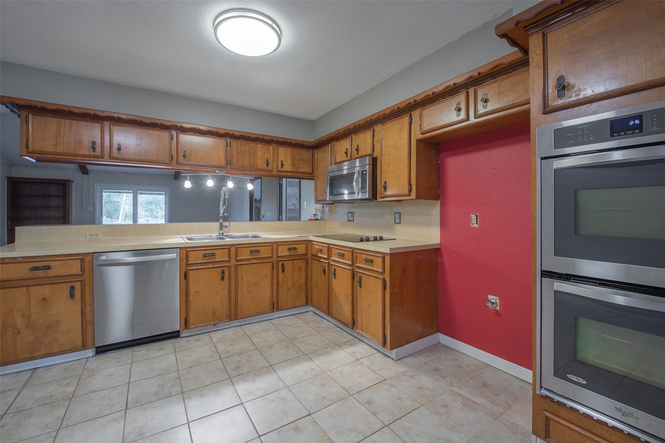 504 Walnut Street Waller, TX 77484 - Photo 11 of 35 Kitchen with Stainless Steel Appliances - Built In Microwave, Double Oven, and Dishwasher