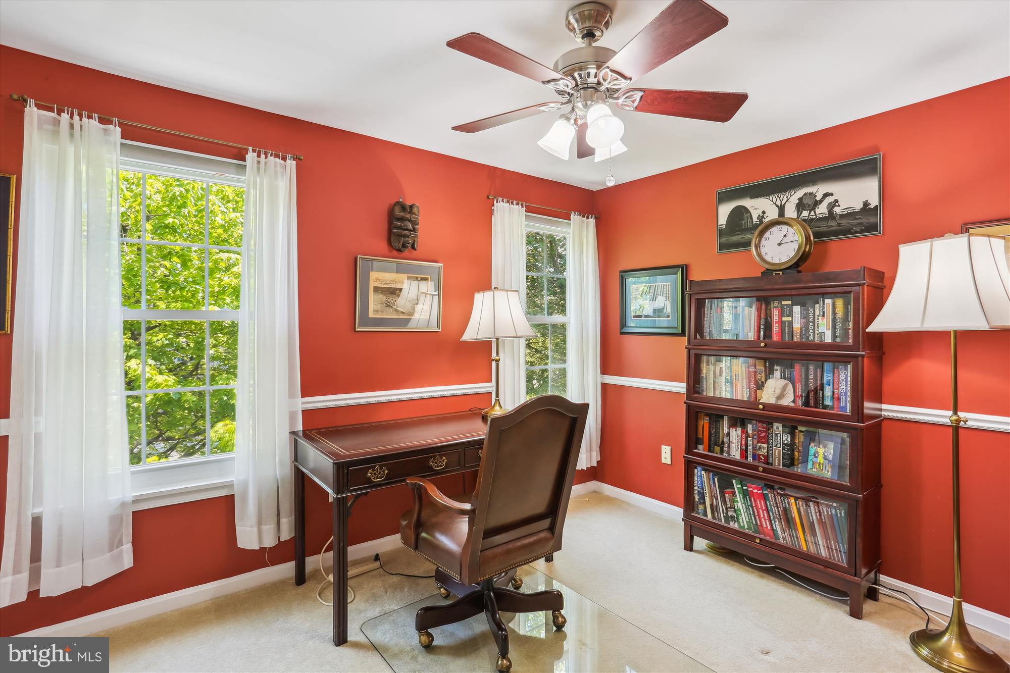 207 Rabbitt Road Gaithersburg, MD 20878 - Photo 28 of 38 a view of a livingroom with furniture and a bookshelf