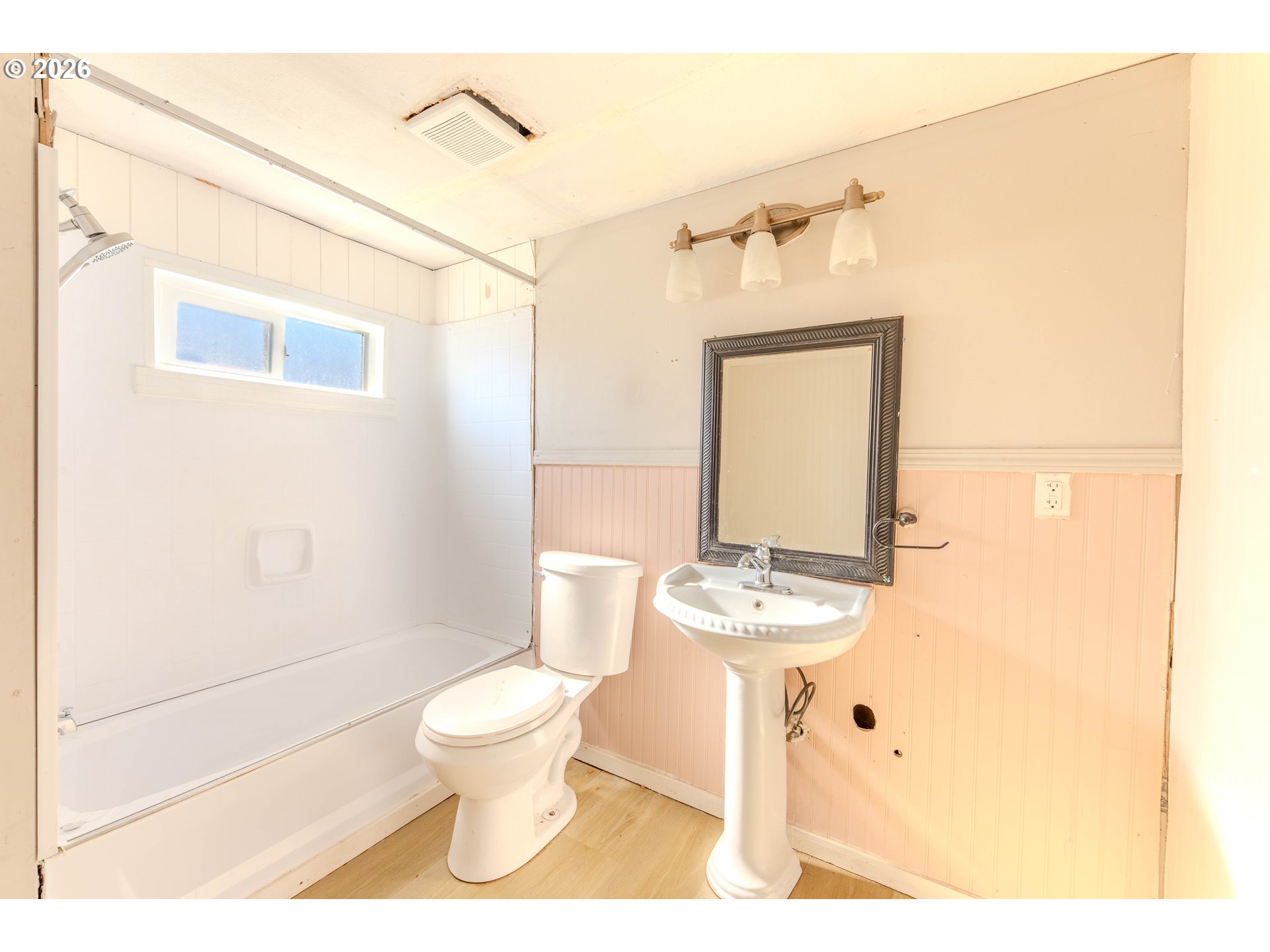 1999 Jansen Way, Unit 66 Woodburn, OR 97071 - Photo 13 of 26 a bathroom with a toilet a sink and a mirror