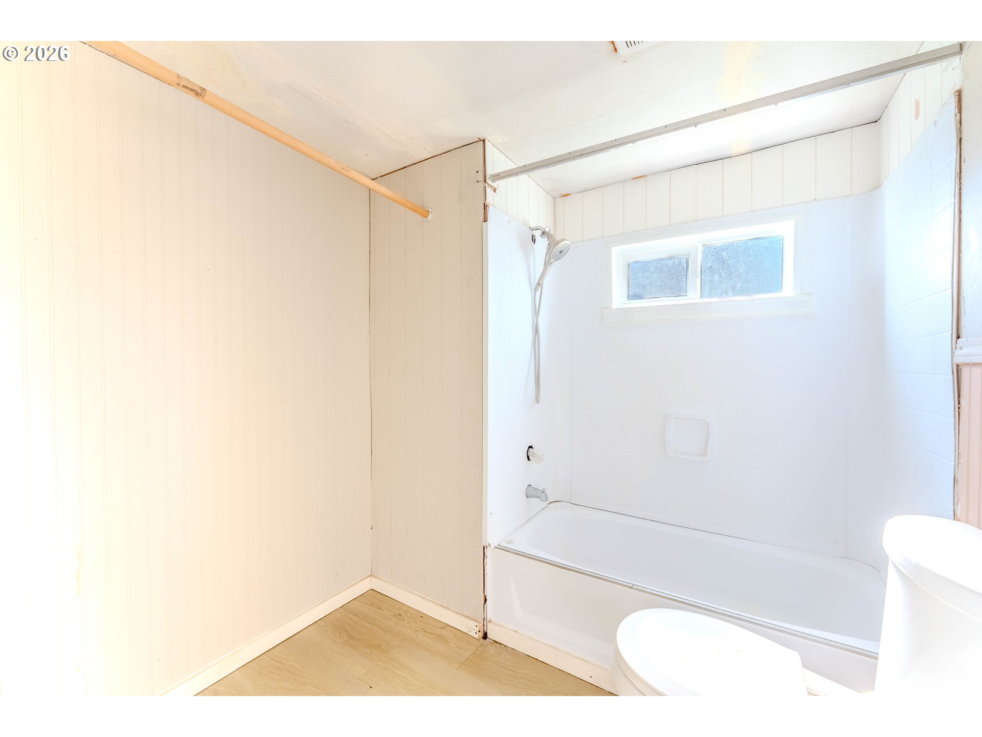 1999 Jansen Way, Unit 66 Woodburn, OR 97071 - Photo 14 of 26 a bathroom with a shower and a toilet