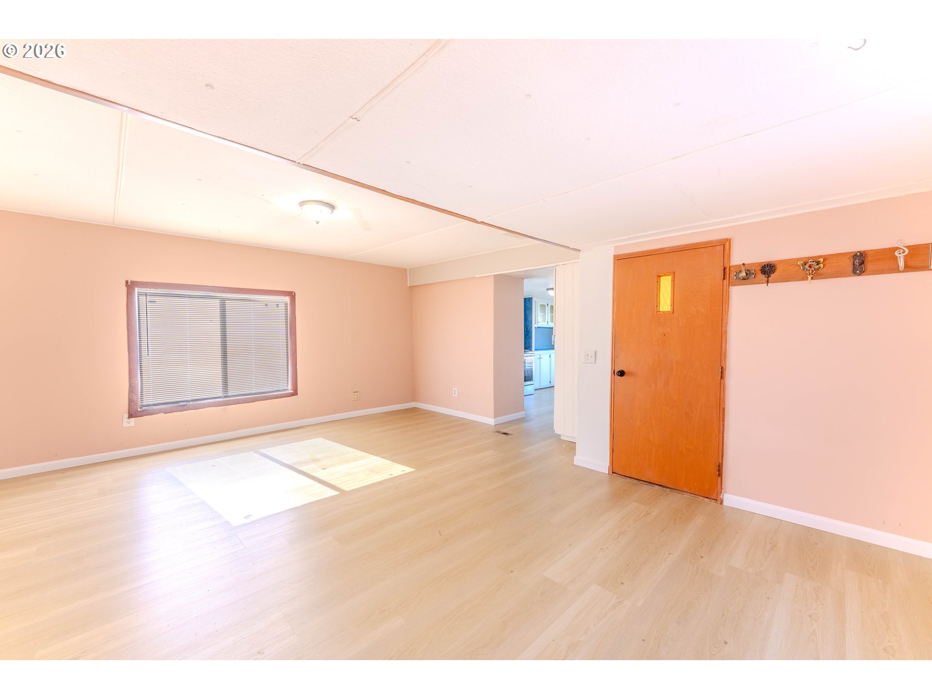 1999 Jansen Way, Unit 66 Woodburn, OR 97071 - Photo 6 of 26 a view of an empty room with a window