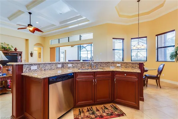 a kitchen with a stove and cabinets