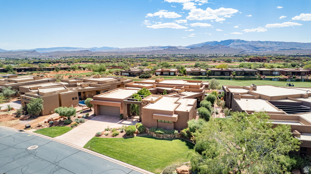 2331 West Entrada Trail, Unit 61 St. George, UT 84770 - Photo 63 of 69 Modern Southwestern-style residence with a flat roofline and stucco exterior